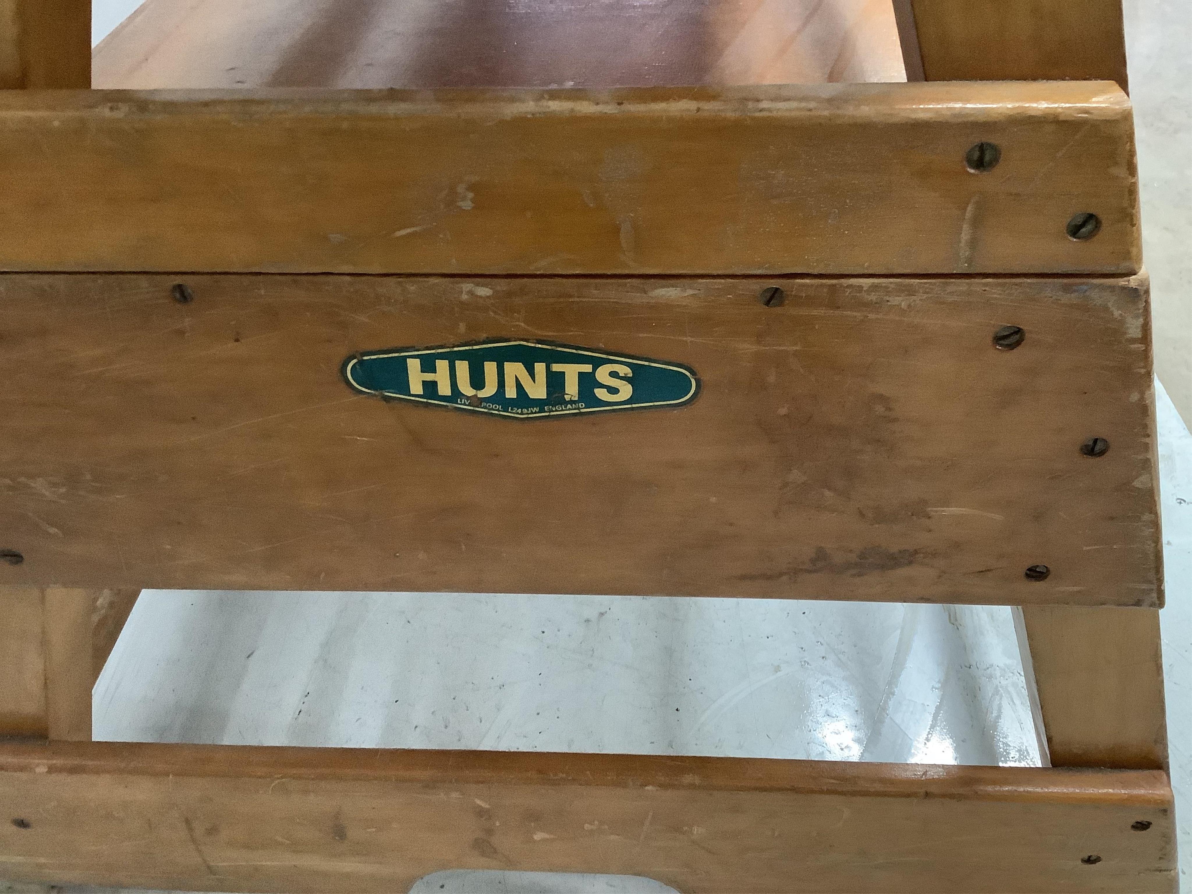 A vintage 'Hunts' gymnasium vaulting horse, length 137cm, height 91cm. Condition - fair wear and tear but essentially good